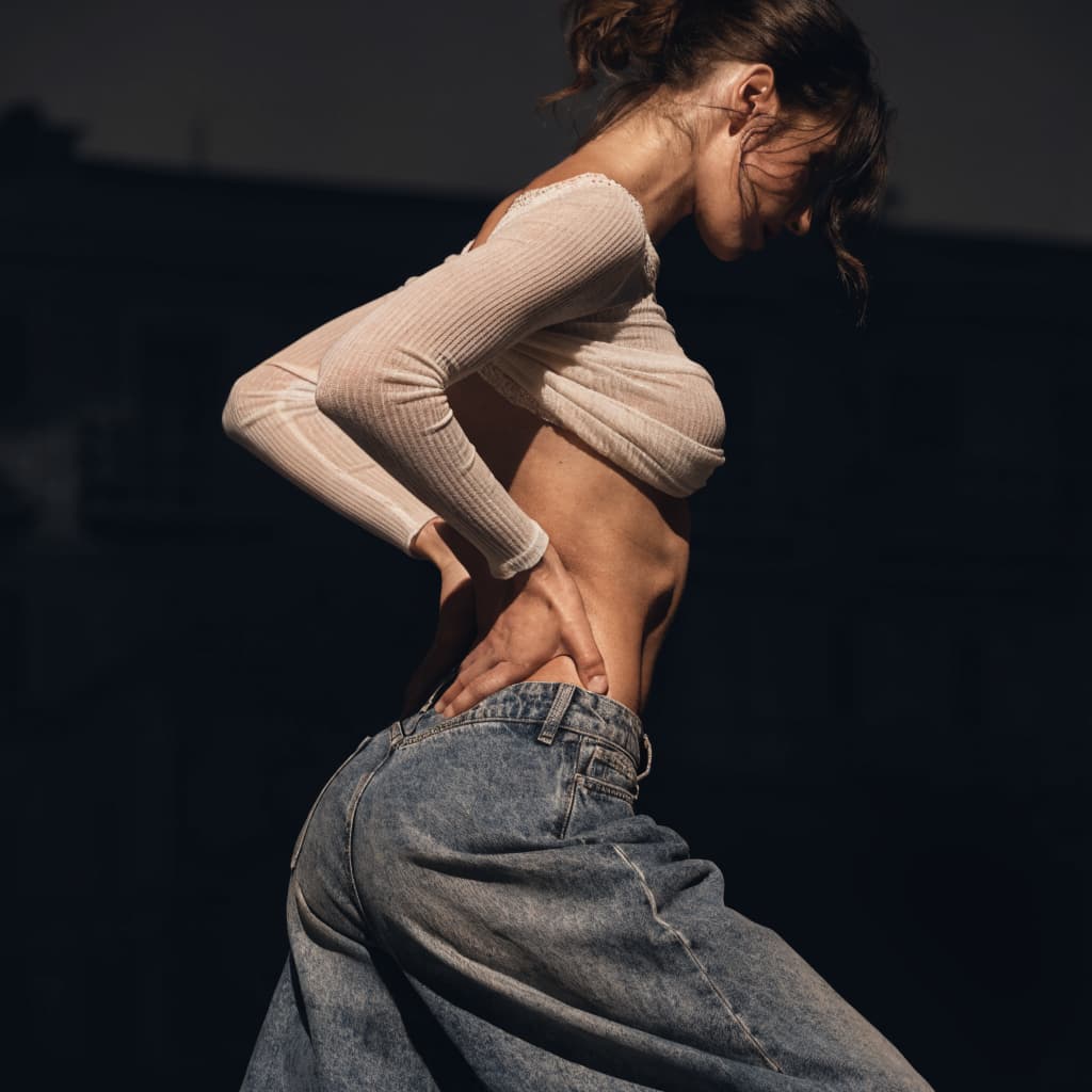 Toned midsection showcasing body lift results