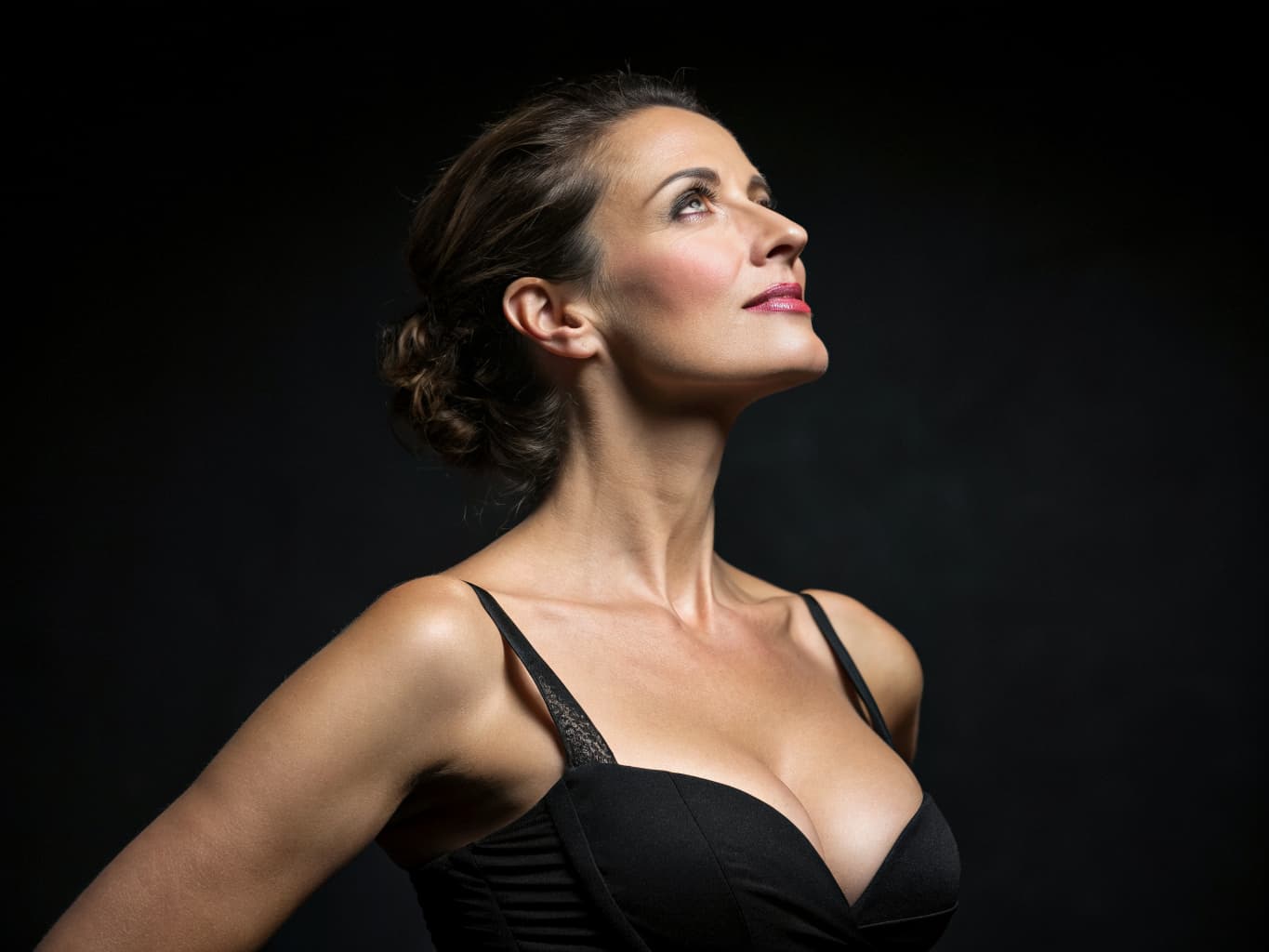 Elegant woman showcasing natural beauty and confidence