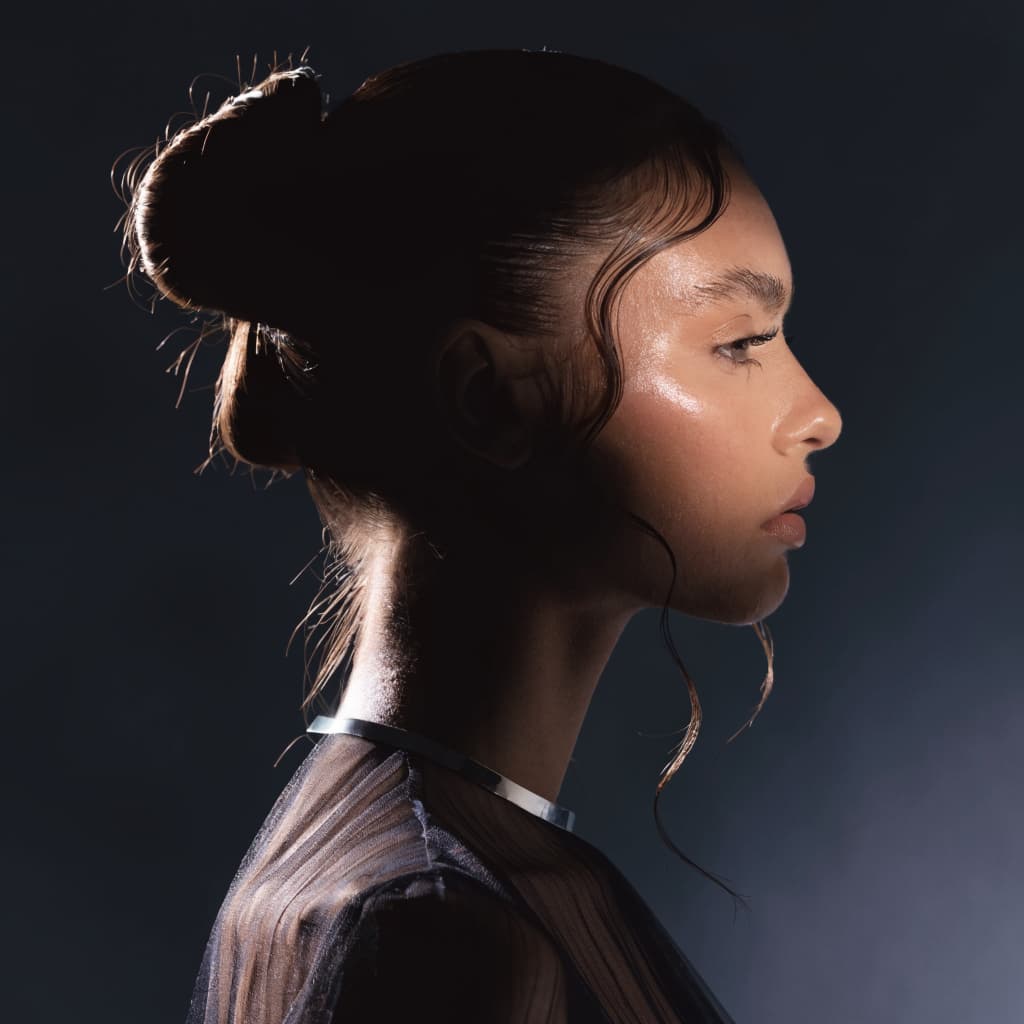 Side profile representing chin implant surgery
