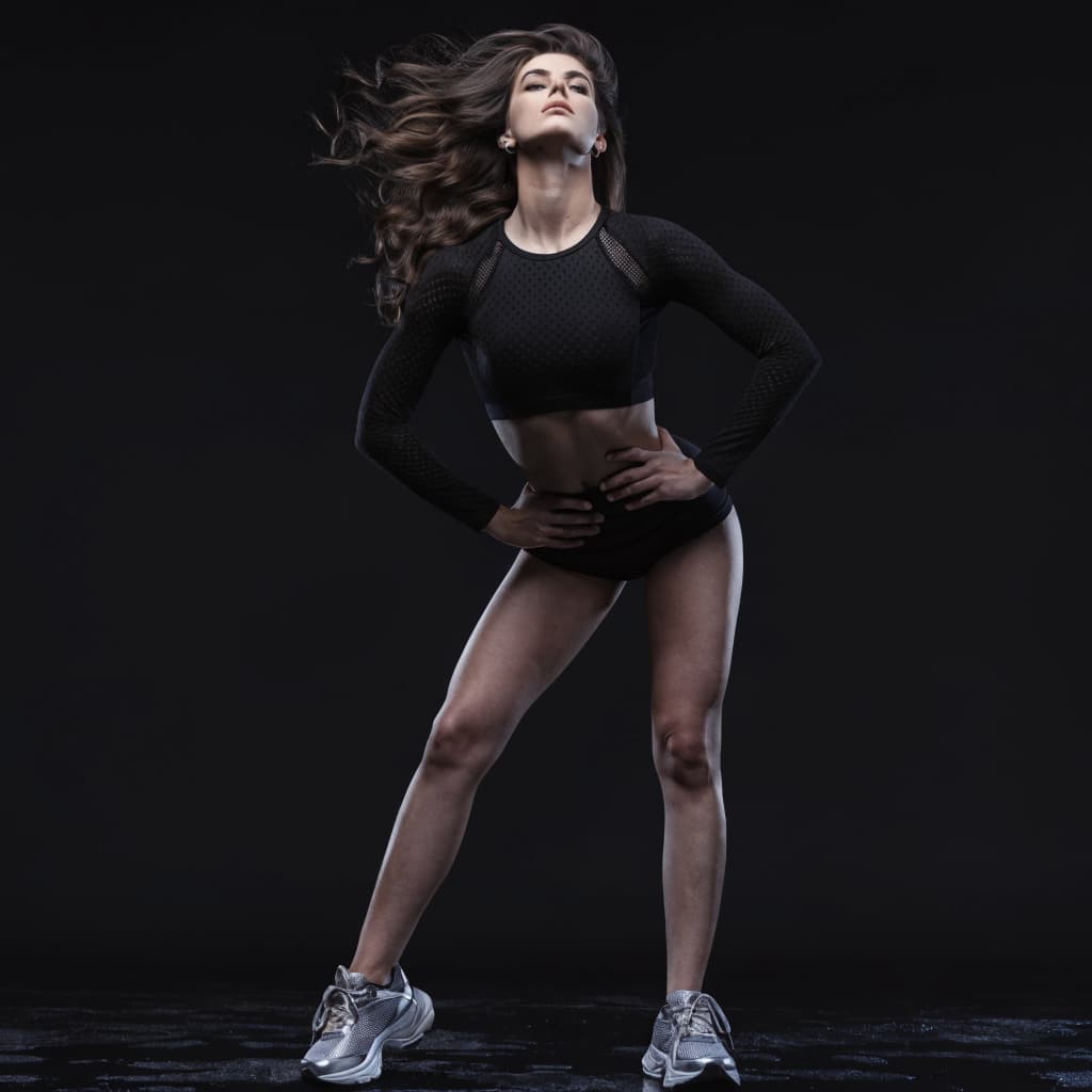 Woman with toned abdomen representing tummy tuck results
